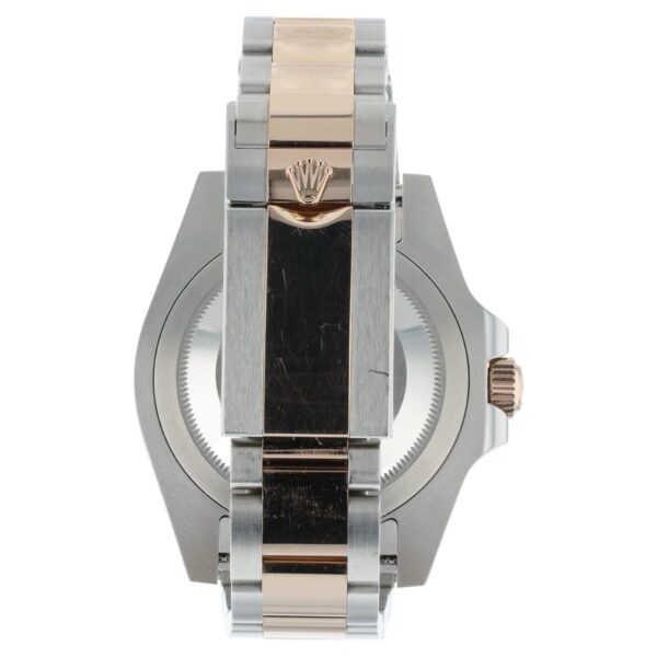 57_0c018d5c-542a-4b86-99d7-9d6b643d079f 2024 Rolex GMT Black Dial Gold & Steel 40mm Automatic Men’s Watch 126711CHNR