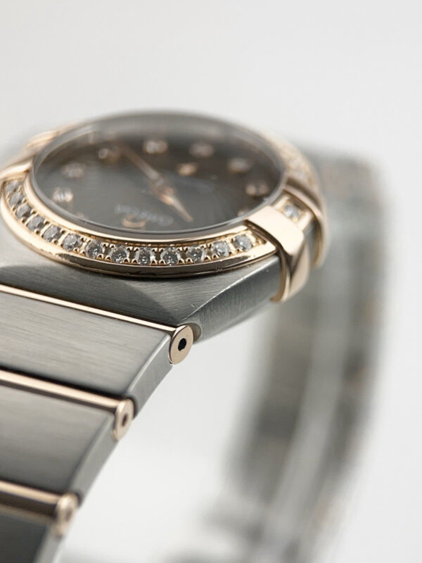 57_0c53cc85-87d1-4375-9329-1a7cfa3c6463 Omega Constellation Rose Gold & Steel Brown Dial 24mm Quartz 123.25.24.60.63.001