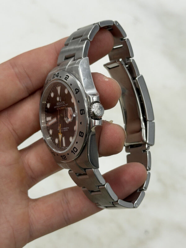 57_2ee21564-3c96-470c-8dbe-2fe38cfa83fc Rolex Explorer II Stainless Steel Black Dial 42mm Automatic Mens Watch 216570