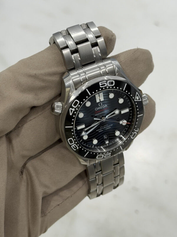 57_4cac9ca8-333b-41c3-8c21-4107d756c0a3 Omega Seamaster Men’s Black Dial Swiss Automatic Watch 210.30.42.20.01.001