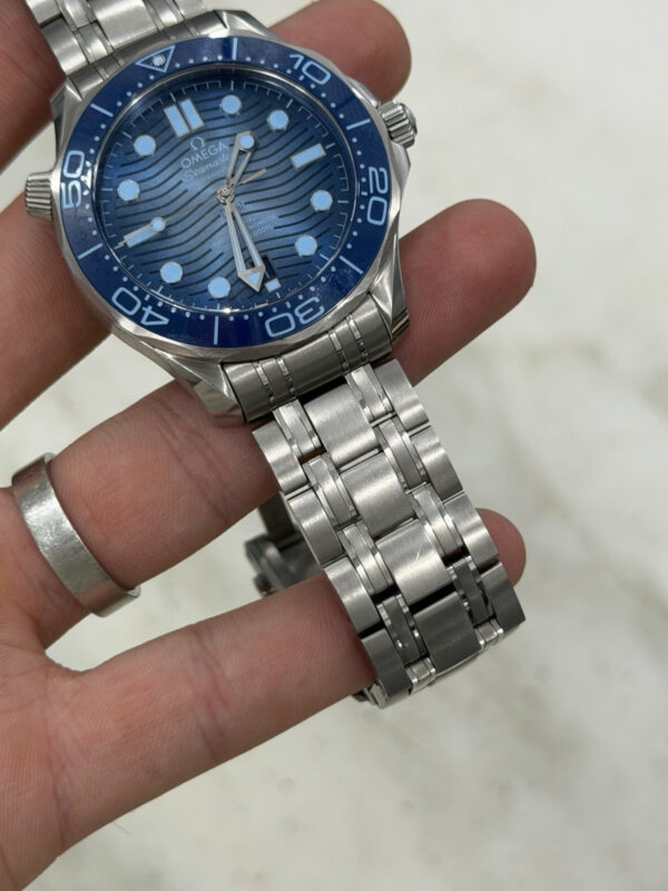 57_664f75eb-08c1-4368-b59a-5328d4106c54 Omega Seamaster Diver 300M Summer Blue Edition 42mm 210.30.42.20.03.003 – B/P