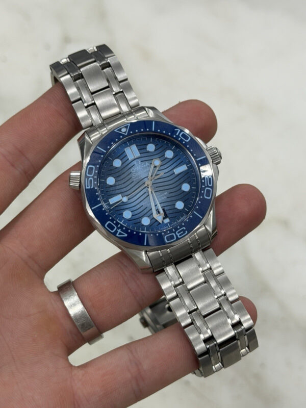 57_9956b90a-c72b-414a-a23c-987b377fc306 Omega Seamaster Diver 300M Summer Blue Edition 42mm 210.30.42.20.03.003 – B/P