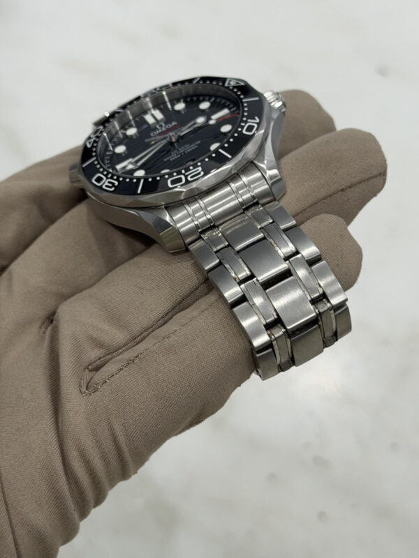 57_a4d1c812-519e-4419-9c58-394fa1b41055 Omega Seamaster Men’s Black Dial Swiss Automatic Watch 210.30.42.20.01.001