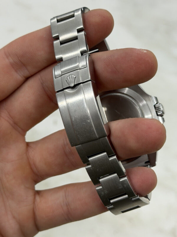 57_b7cce062-5a24-4d8d-8af4-5e805996da1a Rolex Explorer II Stainless Steel Black Dial 42mm Automatic Mens Watch 216570