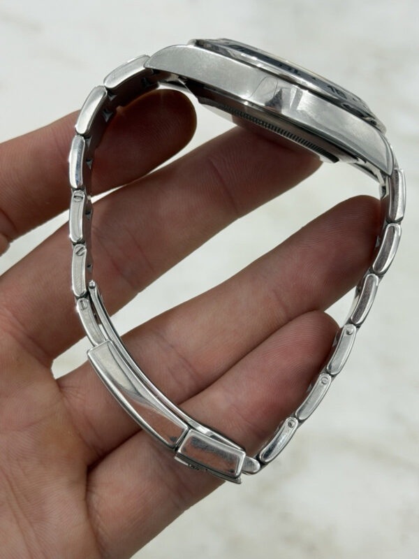 57_bc892ad8-a2ba-4251-a91b-51296bf1a6ea Rolex Explorer II Stainless Steel Black Dial 42mm Automatic Mens Watch 216570