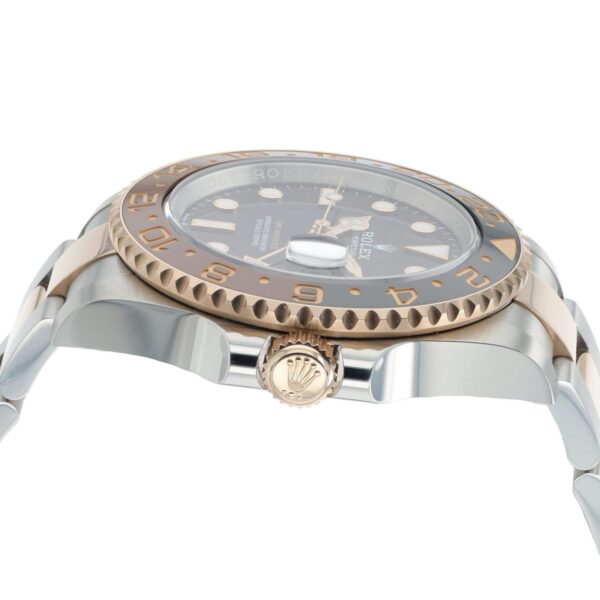 57_bd0f6366-da79-42c9-8891-f133a82c74f1 2024 Rolex GMT Black Dial Gold & Steel 40mm Automatic Men’s Watch 126711CHNR