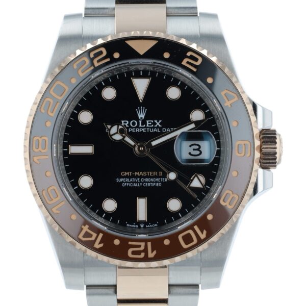 57_c344ac3b-0f0f-46bd-95f0-a76cad8b2ca9 2024 Rolex GMT Black Dial Gold & Steel 40mm Automatic Men’s Watch 126711CHNR