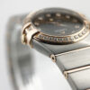 57_c59852e5-770f-4bf8-8dd5-06d150db818e Omega Constellation Rose Gold & Steel Brown Dial 24mm Quartz 123.25.24.60.63.001