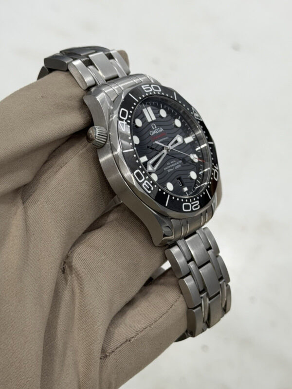 57_c9770a77-9df0-4cba-bddc-24a7a5a3eca6 Omega Seamaster Men’s Black Dial Swiss Automatic Watch 210.30.42.20.01.001