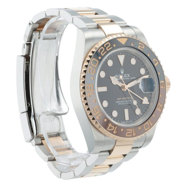 57_f2b4e2fd-844e-4d5d-a348-08ffb426e016 2024 Rolex GMT Black Dial Gold & Steel 40mm Automatic Men’s Watch 126711CHNR