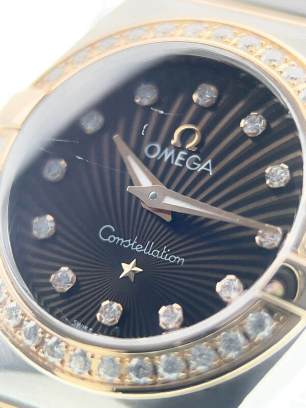 57_fa676f83-3ea5-4f08-a912-83073f4ecd6d Omega Constellation Rose Gold & Steel Brown Dial 24mm Quartz 123.25.24.60.63.001